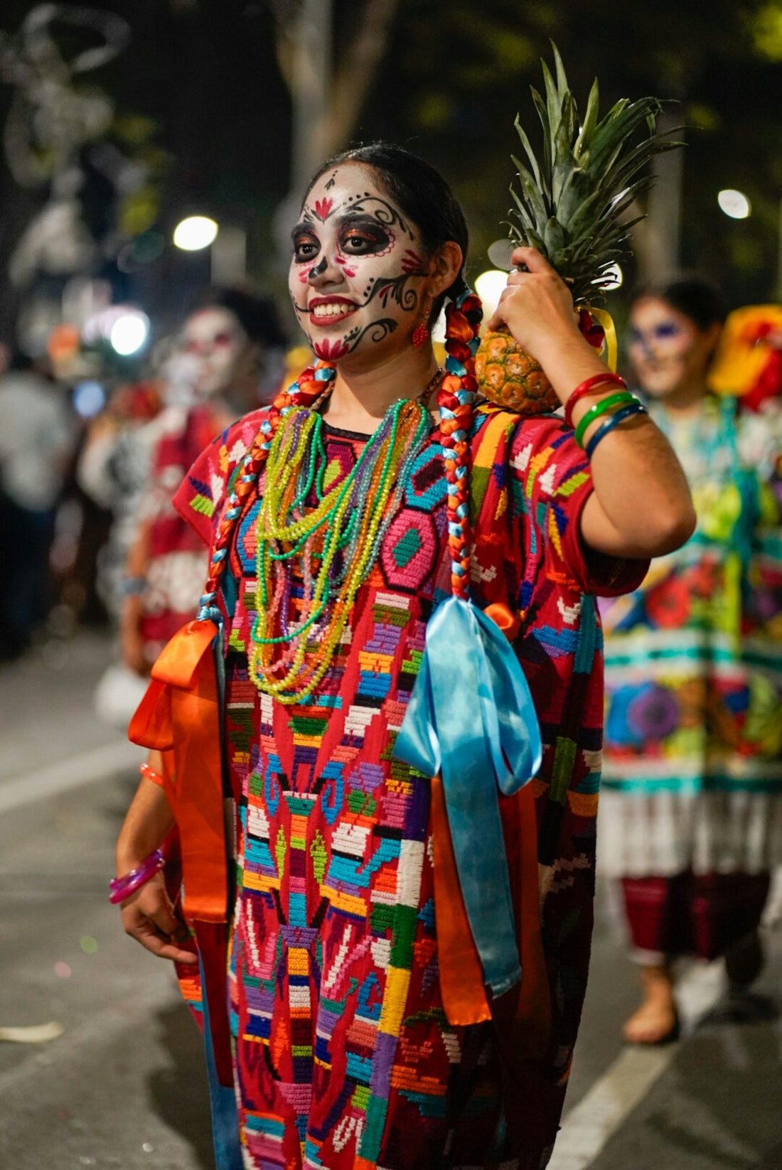 Woman celebrates day of the dead with festive attire